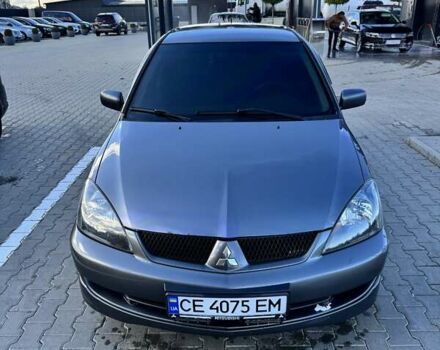 Мицубиси Лансер 2006 в Черновцах на Automoto.ua Серый Мицубиси Лансер, объемом двигателя 1.6 л и пробегом 299 тыс. км за 4300 $, фото 1 на Automoto.ua