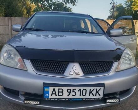 Сірий Міцубісі Lancer, об'ємом двигуна 1.58 л та пробігом 250 тис. км за 4700 $, фото 1 на Automoto.ua