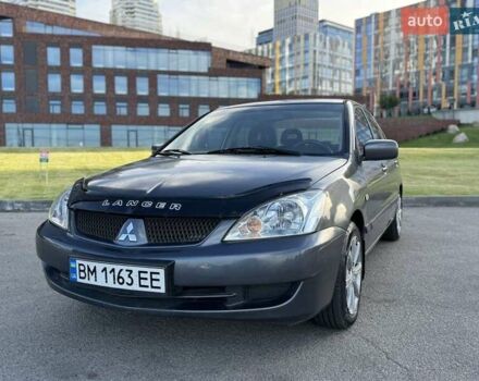 Сірий Міцубісі Lancer, об'ємом двигуна 1.58 л та пробігом 267 тис. км за 3999 $, фото 1 на Automoto.ua