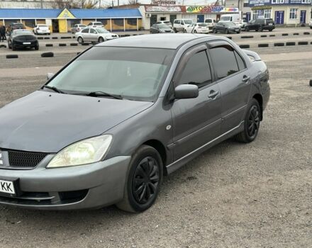 Серый Мицубиси Лансер, объемом двигателя 1.6 л и пробегом 250 тыс. км за 2550 $, фото 1 на Automoto.ua