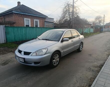 Сірий Міцубісі Lancer, об'ємом двигуна 1.6 л та пробігом 152 тис. км за 2800 $, фото 1 на Automoto.ua
