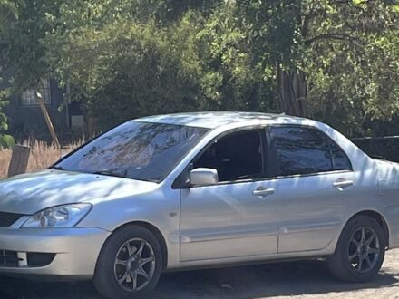 Міцубісі Lancer 2006 у Полтаві на Automoto.ua Сірий Міцубісі Lancer, об'ємом двигуна 1.6 л та пробігом 250 тис. км за 4500 $, фото 1 на Automoto.ua