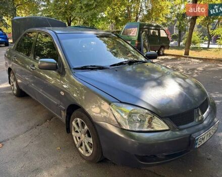 Сірий Міцубісі Lancer, об'ємом двигуна 1.58 л та пробігом 267 тис. км за 3300 $, фото 1 на Automoto.ua