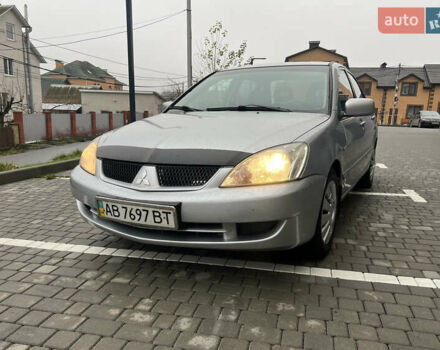 Сірий Міцубісі Lancer, об'ємом двигуна 1.58 л та пробігом 333 тис. км за 2450 $, фото 1 на Automoto.ua