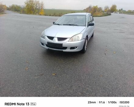 Сірий Міцубісі Lancer, об'ємом двигуна 0 л та пробігом 312 тис. км за 998 $, фото 1 на Automoto.ua