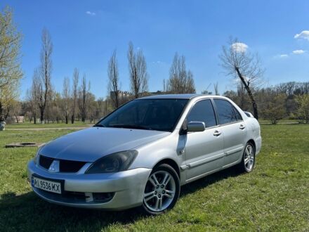 Мицубиси Лансер 2006 в Каменское - Днепродзержинск на Automoto.ua Серый Мицубиси Лансер, объемом двигателя 2 л и пробегом 290 тыс. км за 3900 $, фото 1 на Automoto.ua