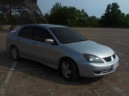 Міцубісі Lancer 2006 у Харкові на Automoto.ua Сірий Міцубісі Lancer, об'ємом двигуна 2 л та пробігом 240 тис. км за 4500 $, фото 1 на Automoto.ua