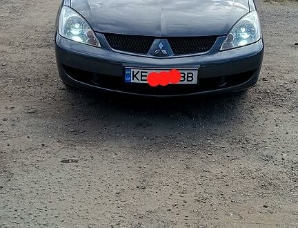 Серый Мицубиси Лансер, объемом двигателя 1.6 л и пробегом 275 тыс. км за 4700 $, фото 1 на Automoto.ua