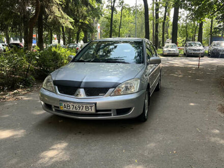 Сірий Міцубісі Lancer, об'ємом двигуна 1.6 л та пробігом 330 тис. км за 3200 $, фото 1 на Automoto.ua