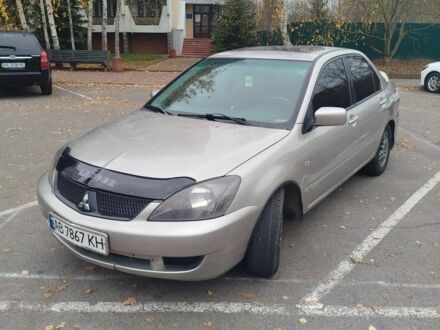 Сірий Міцубісі Lancer, об'ємом двигуна 2 л та пробігом 330 тис. км за 3450 $, фото 1 на Automoto.ua