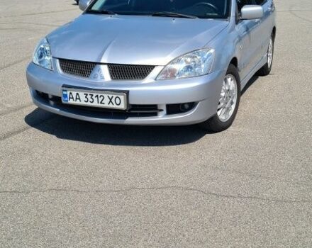 Сірий Міцубісі Lancer, об'ємом двигуна 1.6 л та пробігом 227 тис. км за 3800 $, фото 1 на Automoto.ua