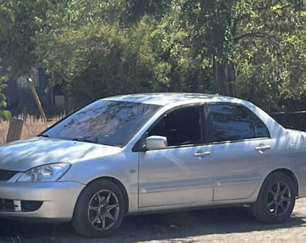 Сірий Міцубісі Lancer, об'ємом двигуна 1.6 л та пробігом 257 тис. км за 4300 $, фото 1 на Automoto.ua
