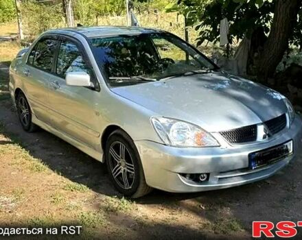 Серый Мицубиси Лансер, объемом двигателя 1.6 л и пробегом 227 тыс. км за 4400 $, фото 1 на Automoto.ua
