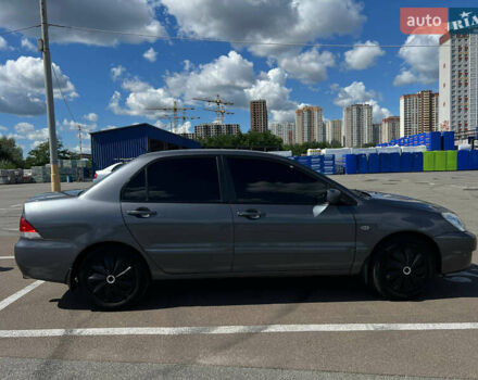 Сірий Міцубісі Lancer, об'ємом двигуна 1.6 л та пробігом 223 тис. км за 4500 $, фото 1 на Automoto.ua