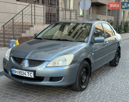 Сірий Міцубісі Lancer, об'ємом двигуна 1.6 л та пробігом 152 тис. км за 3800 $, фото 1 на Automoto.ua