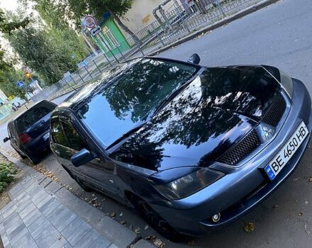 Серый Мицубиси Лансер, объемом двигателя 1.6 л и пробегом 24000 тыс. км за 3800 $, фото 1 на Automoto.ua