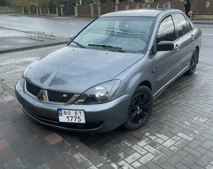 Сірий Міцубісі Lancer, об'ємом двигуна 1.6 л та пробігом 244 тис. км за 2999 $, фото 1 на Automoto.ua