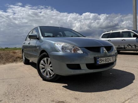 Сірий Міцубісі Lancer, об'ємом двигуна 1.6 л та пробігом 140 тис. км за 4999 $, фото 1 на Automoto.ua