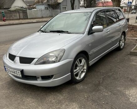 Сірий Міцубісі Lancer, об'ємом двигуна 1.6 л та пробігом 270 тис. км за 5000 $, фото 1 на Automoto.ua