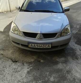 Сірий Міцубісі Lancer, об'ємом двигуна 1.6 л та пробігом 336 тис. км за 4200 $, фото 1 на Automoto.ua