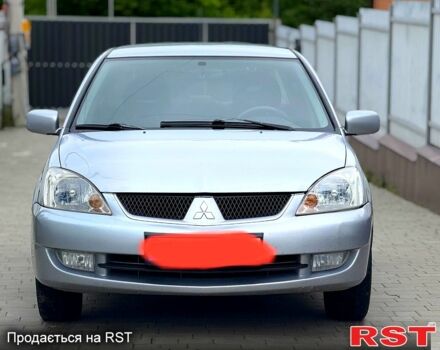Сірий Міцубісі Lancer, об'ємом двигуна 1.6 л та пробігом 200 тис. км за 4000 $, фото 1 на Automoto.ua