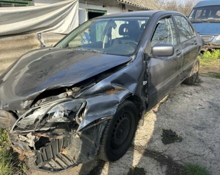 Сірий Міцубісі Lancer, об'ємом двигуна 1.6 л та пробігом 200 тис. км за 1150 $, фото 1 на Automoto.ua
