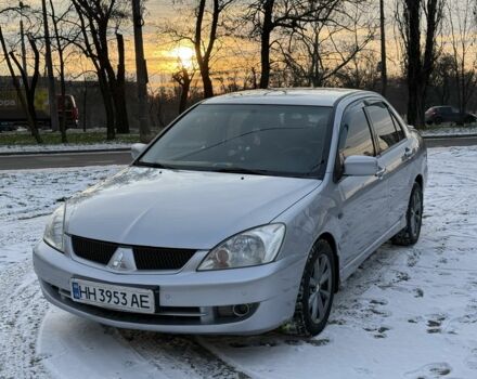 Серый Мицубиси Лансер, объемом двигателя 1.6 л и пробегом 240 тыс. км за 4600 $, фото 1 на Automoto.ua