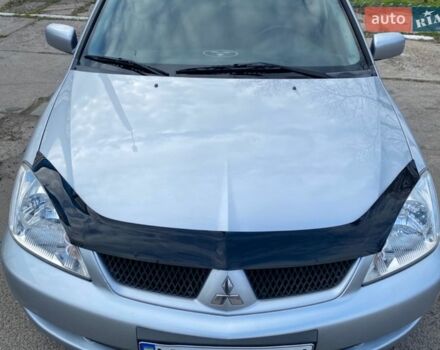 Серый Мицубиси Лансер, объемом двигателя 1.58 л и пробегом 288 тыс. км за 4200 $, фото 1 на Automoto.ua