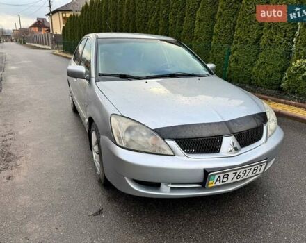 Сірий Міцубісі Lancer, об'ємом двигуна 1.58 л та пробігом 333 тис. км за 2750 $, фото 1 на Automoto.ua