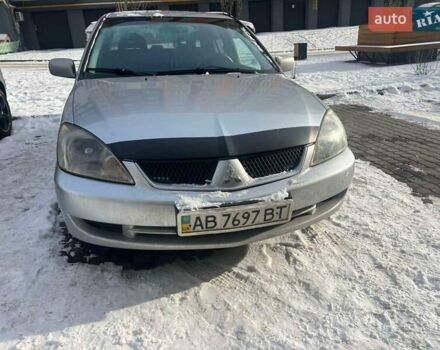 Сірий Міцубісі Lancer, об'ємом двигуна 1.58 л та пробігом 333 тис. км за 2800 $, фото 1 на Automoto.ua