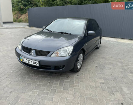 Сірий Міцубісі Lancer, об'ємом двигуна 1.58 л та пробігом 162 тис. км за 4650 $, фото 1 на Automoto.ua