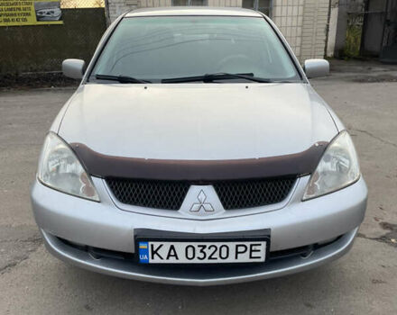Сірий Міцубісі Lancer, об'ємом двигуна 1.58 л та пробігом 430 тис. км за 2550 $, фото 1 на Automoto.ua