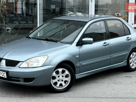 Сірий Міцубісі Lancer, об'ємом двигуна 1.58 л та пробігом 275 тис. км за 4600 $, фото 1 на Automoto.ua