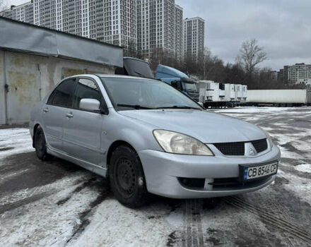 Сірий Міцубісі Lancer, об'ємом двигуна 1.58 л та пробігом 220 тис. км за 3990 $, фото 1 на Automoto.ua