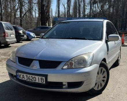 Серый Мицубиси Лансер, объемом двигателя 1.6 л и пробегом 385 тыс. км за 3200 $, фото 1 на Automoto.ua