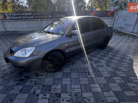 Міцубісі Lancer 2006 у Хмельницькому на Automoto.ua Сірий Міцубісі Lancer, об'ємом двигуна 1.58 л та пробігом 280 тис. км за 3600 $, фото 1 на Automoto.ua