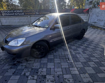 Сірий Міцубісі Lancer, об'ємом двигуна 1.58 л та пробігом 280 тис. км за 3600 $, фото 1 на Automoto.ua