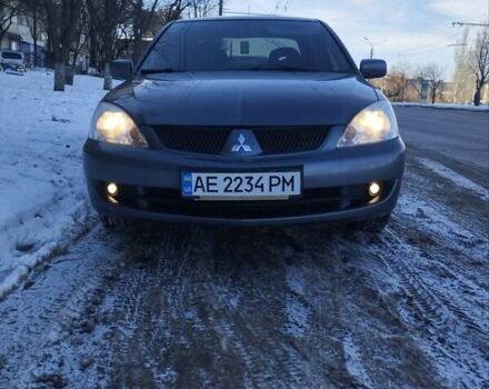 Сірий Міцубісі Lancer, об'ємом двигуна 1.58 л та пробігом 217 тис. км за 3500 $, фото 1 на Automoto.ua