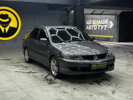 Сірий Міцубісі Lancer, об'ємом двигуна 1.6 л та пробігом 300 тис. км за 4600 $, фото 1 на Automoto.ua