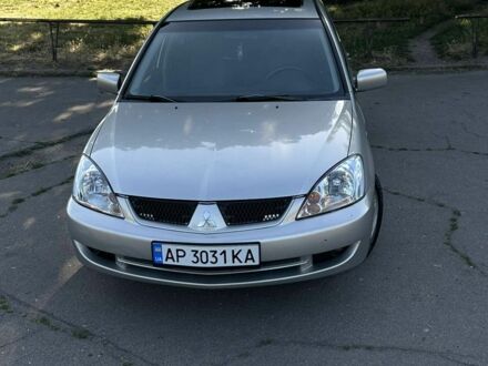 Сірий Міцубісі Lancer, об'ємом двигуна 1.6 л та пробігом 185 тис. км за 4500 $, фото 1 на Automoto.ua