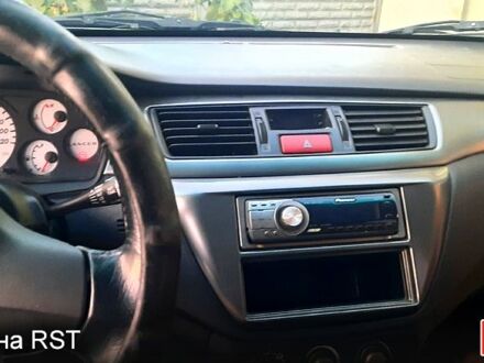 Сірий Міцубісі Lancer, об'ємом двигуна 1.6 л та пробігом 237 тис. км за 5000 $, фото 1 на Automoto.ua