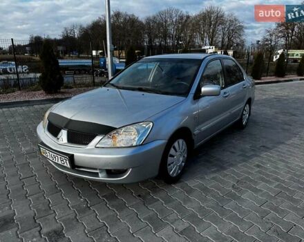 Серый Мицубиси Лансер, объемом двигателя 1.58 л и пробегом 333 тыс. км за 2750 $, фото 1 на Automoto.ua