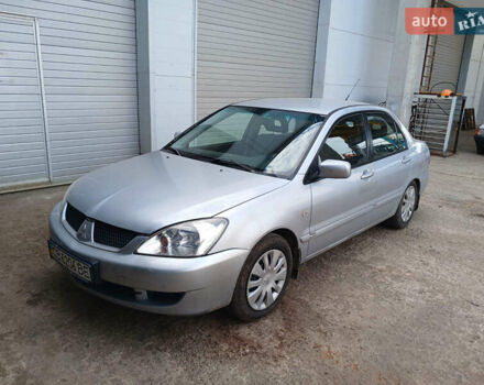 Сірий Міцубісі Lancer, об'ємом двигуна 1.58 л та пробігом 215 тис. км за 4000 $, фото 1 на Automoto.ua