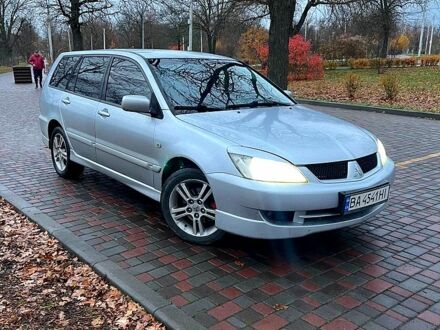 Сірий Міцубісі Lancer, об'ємом двигуна 2 л та пробігом 346 тис. км за 3900 $, фото 1 на Automoto.ua