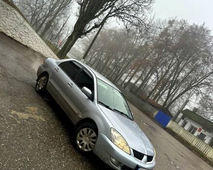Сірий Міцубісі Lancer, об'ємом двигуна 1.6 л та пробігом 123 тис. км за 4000 $, фото 1 на Automoto.ua