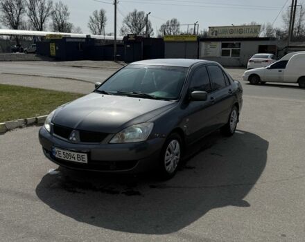 Серый Мицубиси Лансер, объемом двигателя 1.6 л и пробегом 240 тыс. км за 2550 $, фото 1 на Automoto.ua