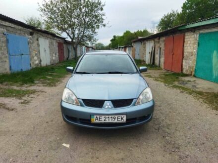 Сірий Міцубісі Lancer, об'ємом двигуна 1.6 л та пробігом 252 тис. км за 5700 $, фото 1 на Automoto.ua