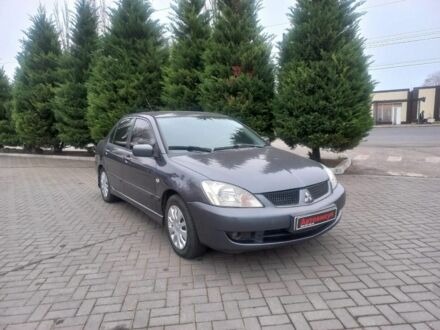 Серый Мицубиси Лансер, объемом двигателя 1.6 л и пробегом 162 тыс. км за 4650 $, фото 1 на Automoto.ua