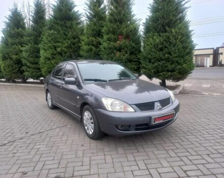 Серый Мицубиси Лансер, объемом двигателя 1.6 л и пробегом 162 тыс. км за 4650 $, фото 1 на Automoto.ua