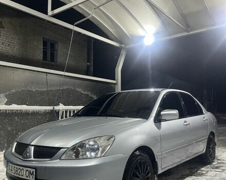 Сірий Міцубісі Lancer, об'ємом двигуна 1.6 л та пробігом 3 тис. км за 2600 $, фото 1 на Automoto.ua